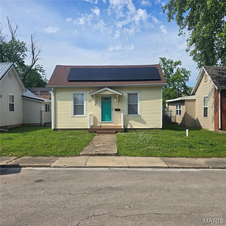 Experience a charming blend of classic appeal and modern efficiency at 911 S 2nd ST, FSTS, MO 63028. This single-family residence, built in 1962, offers a unique opportunity to embrace comfortable living in a sought-after location. It is located in the heart of town- walking distance to shops, parks and schools, in Festus school district. This appealing bungalow provides two bedrooms and two bathrooms, as well as a bonus room upstairs, offering practical living spaces designed for ease and comfort. Adding to its contemporary appeal, this property is equipped with solar panels, providing a forward-thinking approach to homeownership. Discover the potential of this inviting bungalow and envision your next chapter here.