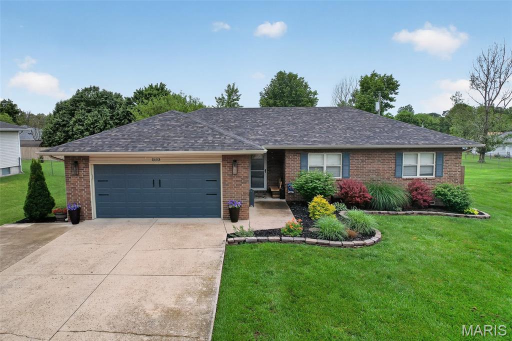 Welcome home to 1533 Ryan Street! This home sits in a desirable neighborhood and has been meticulously maintained. This 3 bedroom 2 bathroom home offers a spacious and functional layout, complete with a designated dining area and several recent updates. Major updates include newer shingles and HVAC, giving you the peace of mind you deserve. A bonus this house offers is a storm shelter built right into the garage floor. You'll also love the oversized primary suite and bathroom that's been recently remodeled. Outside in the backyard you'll find a covered deck, perfect for sitting and winding, an area for a fire pit, and a fenced in back yard. This is one you won't want to miss, schedule your private showing today!