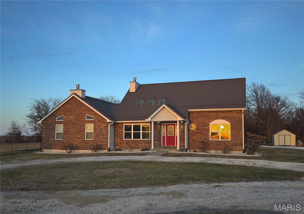 LOOK!!! PRICE ADJUSTMENT!!! Sellers super motivated to sell! 
One and one half story ranch on 3.38 acres along Hwy 61 just south of Bowling Green. The perfect blend of space, privacy, and an expansive Midwestern view. Partial fencing for pets or small livestock, a fire pit and room for playground, pool or other recreation. Surrounded by open fields & a wooded backdrop make for a peaceful retreat. From the sweeping front yard, take in sunsets and watch storms roll in across the Missouri plains.

Step inside to discover a lovely living room with skylights in the vaulted ceiling throwing off great natural lighting. You'll be impressed with the spacious great room designed for both everyday comfort and upscale entertaining. Large enough for a giant rec room or even divide it into different functional spaces. Generous proportions and an open flow provide ample space to host gatherings large or small, while the main and upper levels offer flexibility for a variety of lifestyles. Extending the home’s potential even further, a full unfinished basement presents endless possibilities—whether envisioned as additional living space, a private retreat, or exceptional storage.

This property delivers the enjoyment of country living paired with convenience of town amenities close by.