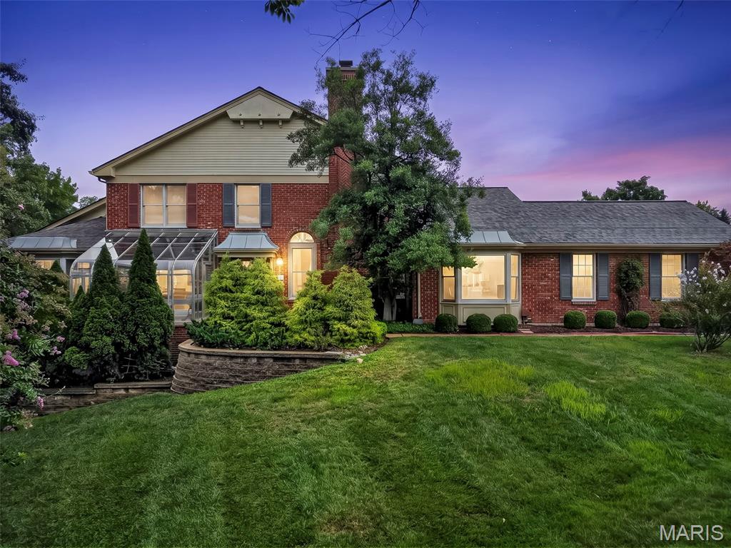 Upscale and well maintained Baywood Villages neighborhood just minutes to HWY 40. If you want one of the best locations in West County this is it! Impressive entry has 2-double closets, vinyl floor,crystal chandelier & opens to magnificent 31 x 16 Living Room w/high ceiling,soft colored walls,white triple crown molding,Open staircase to the loft w/ cascading glass and copper dome fixture,recessed lights,skylight & new raised hearth FP w/gas & top quality Quartz. Double hung windows are on either side of FP w/transom accent windows. Large DR adjacent to LR has coffered ceiling,crown molding,5x5 picture window bay w/2 double hung windows on either side.Kitchen is all white with well thought out amenities...42" cabinets(26 smooth surface and 8 with glass fronts) ,SS LG appliances w/electric smooth cook top/convection oven & SS Exhaust hood. Built-in 5 x 2 Butlers pantry has 4 glass front cabinets with glass shelving. Also included is 3 horizontal drawers for pots and pans,7 x 2 deep pantry, and sleek gloss white subway tile backsplash. Breakfast room has coffered ceiling and opens to quaint patio for your morning coffee! Main floor laundry has lots of cabinets and sink and is conveniently located from the garage.Half bath has new Quartz vanity top, hardware & crystall chandelier.Bonus/Office room on main floor has a sliding door to the greenhouse and herbs all year round! Primary bedroom has new quality neutral carpeting,coffered ceiling w/crown molding, crystal chandelier, 2-double closets and 16 x 15 deck. Adjacent to the primary bedroom is a huge L-shaped walk-in closet and 2 hall closets entering the bath. The mostly updated bath features Quartz top vanity,sunken jet tub, new glass shower w/tile,new mirrors,lighting and hardware. Big Upstairs loft/2nd bedroom has new carpet,crown molding,fan and large walk-in closet w/some built in shelves. Bath has updated vanity w/Quartz top,new mirrors,lighting and double closet.Walk-out Lower level w/carpet and new paint on walls and ceiling has a family room, 3rd bedroom and a sitting room w/windows and atrium door. Bath has new vanity w/Quartz,marble floor, mirror,lighting and hardware. Additionally, there is mostly fresh new paint throughout property w/ walls,ceilings,Moldings and trim.This end unit condo is surrounded by mature trees, meticulous landscape and is ready for your convenience and enjoyment! Roof 2026