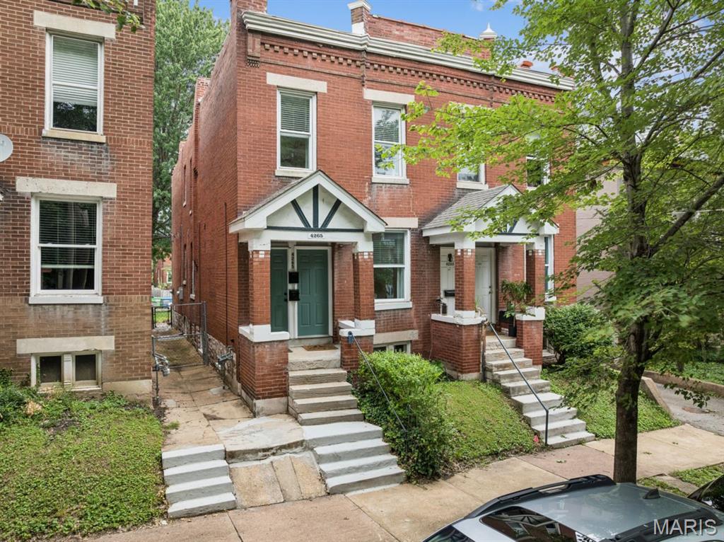 Exceptional opportunity in one of St. Louis’s most coveted corridors — one block from Tower Grove Park and steps from the Missouri Botanical Garden, on a quiet cul-de-sac with easy bike route access. Built in 1906, this 2-family flat blends historic character with major mechanical upgrades: water and sewer lines updated in 2008 (1" copper), central air and high-efficiency furnaces installed in 2024 on both units, and newer vinyl windows throughout. The 1st floor features a 2026 quartz countertop and updated circuit breakers, while the 2nd floor offers a 2026 dishwasher and bathroom vanity, a decorative fireplace, Lenox furnace, and a new breaker box and meter base (2024). Both units are 1 bed/1 bath with spacious rooms. Plenty of storage in basement and washer/dryer hookups. Whether you’re an owner-occupant looking to offset your mortgage or an investor adding to your portfolio, the location alone makes this a standout. Walkable, vibrant, and in constant demand — properties this close to two of the city’s landmark destinations don’t last.