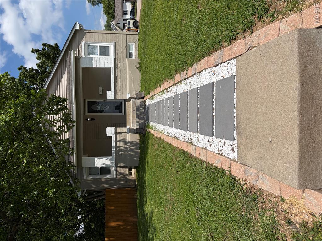 Centrally located with a wonderfully sized private yard!   An all-brick 1940s home that has been fully rehabbed but still retaining its historic character is a highly sought-after blend of vintage charm and modern convenience. This era of homebuilding is known for its durability and practical layouts.  Arched entryways, wood floors, new cabinetry, granite countertops, and modern tile work blended seamlessly with the vintage architectural style.  Old homes have the best stories ... make this one yours!
