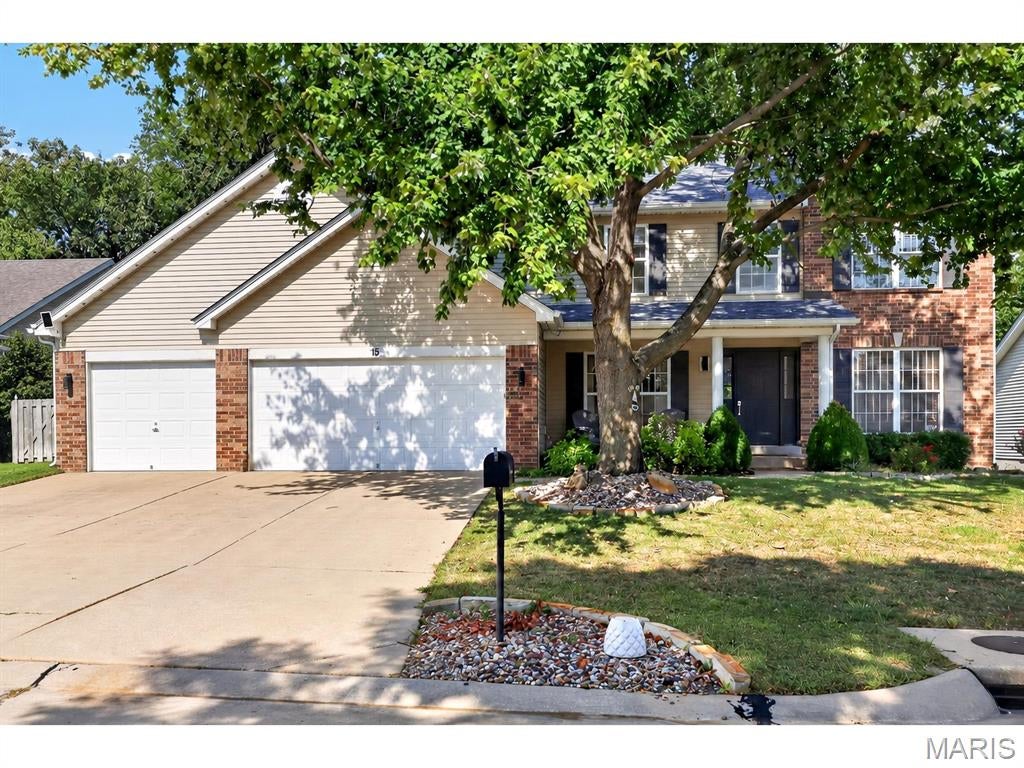 Spacious & exceptionally well maintained! From the moment you arrive, the attractive landscaping and quiet setting near the cul de sac, create a warm welcome. A gracious foyer opens to a private home office and inviting dining room, while the thoughtfully designed floor plan offers an abundance of space for everyday living and entertaining. The open-concept main level features a spacious great room with gas fireplace and bay window, flowing seamlessly into the oversized kitchen and breakfast room. The kitchen features granite countertops, stainless steel appliances, center island, walk-in pantry, and direct access to the deck overlooking the private, wooded backyard. Upstairs, the very spacious primary suite is a true retreat, featuring a large walk-in closet/dressing room and luxurious bath with dual vanities, soaking tub, and separate shower. Three generous bedrooms with walk in closets and a versatile loft/playroom complete the upper level. The finished walkout lower level adds incredible flexibility with a recreation room, bedroom, and full bath—perfect for guests, a home gym, office, or additional living space. New basement French doors open to the backyard and enhance the lower-level living space. The fully fenced backyard backs to peaceful woods and features a gorgeous covered paver patio, creating an inviting outdoor retreat. Recent improvements include new Daikin furnaces and A/C (2022), tankless water heater (2022), finished lower level (2023), new basement French doors (2023), and new roof, gutters and downspouts (2026). A convenient location and spacious three-car garage complete this exceptional home.