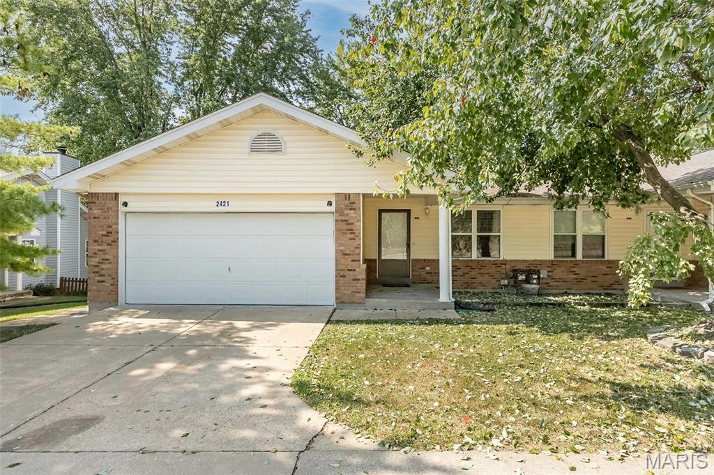 Welcome home to this beautifully updated ranch offering convenient main-floor living in a prime location! Featuring 3 bedrooms, 2 full baths, and 1 half bath, this move-in-ready home boasts new flooring, carpeting, and stylish lighting throughout. The open, functional layout includes a spacious main-floor laundry room and easy everyday living. The updated kitchen opens to a brand-new deck, perfect for morning coffee or outdoor entertaining, plus a private fenced backyard complete with a large storage shed. The finished walk-out lower level expands your living space with a third bedroom, half bath, versatile sleeping area or home office, and abundant storage with built-in shelving. Additional highlights include an attached 2-car garage, ample storage throughout, and a low-maintenance lifestyle. Conveniently located with quick access to Highways 364 and 70, this home is an excellent opportunity for first-time homebuyers, downsizers, or anyone seeking comfortable living in a desirable location. Don't miss your chance to own this updated ranch with flexible living space, modern updates, and a private, fenced backyard retreat!