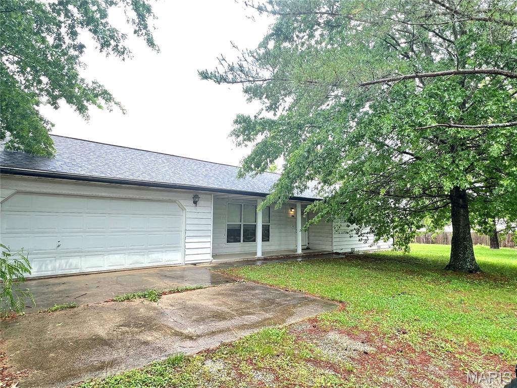 Welcome to this spacious and beautifully maintained 1,500+ sq. ft. home offering the perfect combination of comfort, functionality, and outdoor living. Featuring 2 bedrooms and 2 full baths, this inviting property sits on a level, oversized 1+ acre lot with mature trees and plenty of room to enjoy.

Inside, the open-concept layout is designed for both everyday living and entertaining. The bright kitchen showcases rich wood cabinetry, a pantry, and a large center island with a vegetable sink, providing ample workspace and gathering space. The adjoining living and dining areas create a warm and welcoming atmosphere filled with natural light.

The oversized attached garage offers excellent storage and convenience, while durable steel siding adds long-lasting appeal and low-maintenance living. Step outside to enjoy the covered front porch, ideal for morning coffee or evening relaxation, and a concrete patio overlooking the expansive backyard—perfect for entertaining, gardening, or simply taking in the peaceful setting. Property sits only 18 minutes from Saint Robert and 8 minutes from Dixon. Fishing and floating is only minutes away on the beautiful Gasconade river.

With generous indoor and outdoor space, thoughtful features, and a beautiful setting, this property is ready to welcome you home.
