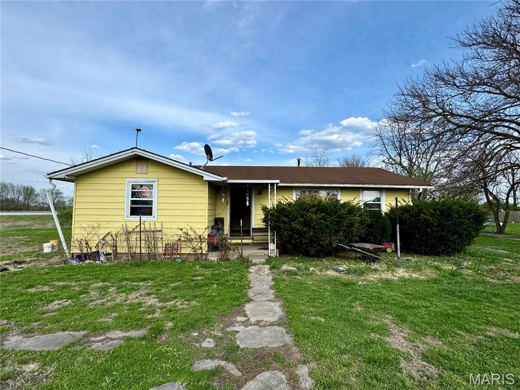 3 Bedroom home on large lot close to Bowling Green. Good investment potential with a Tenant already in place. Potential commercial use.