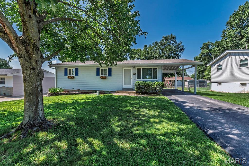 Cute as a Button & Move-In Ready!
Welcome home to this adorable 3-bedroom, 1-bath ranch that’s packed with charm, stylish updates, and an unbeatable location! From the moment you arrive, you’ll fall in love with the inviting curb appeal and oversized carport. Step inside and be greeted by a wall of natural light pouring through the large picture window, perfectly showcasing the eye-catching shiplap ceiling that gives the living room so much character.
The updated kitchen and bath, fresh paint, and beautiful newer luxury vinyl plank flooring create a fresh, modern feel throughout. Big-ticket improvements have already been taken care of, including a new roof/gutters/gutter guards, new water heater, and newer vinyl thermal windows. Even better—all kitchen appliances, plus the washer and dryer, stay with the home, making your move even easier!
The unfinished walk-out lower level offers endless possibilities to create additional living space, a home gym, workshop, or recreation room, while the fenced backyard is ready for pets, play, gardening, or your next backyard barbecue.
Location is the icing on the cake! Enjoy being just minutes from historic Downtown St. Charles, Katy Trail State Park, shopping, dining, major highways, and all within the highly sought-after Francis Howell School District.
Being sold as-is, with the sellers providing a one-year home warranty for added peace of mind. This charming ranch is the perfect place to call home—don’t let it get away!