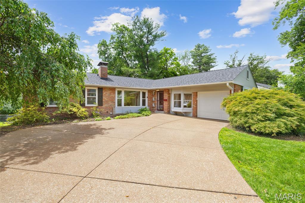 Lovely brick home located near Southwest Park in Webster Groves. Enjoy this 3 plus bedroom, 3.5 baths home with private fenced back yard. Walk into a spacious living room with a gas log fireplace, next to the spacious dining room. The kitchen is eat in with access to deck and back yard for BBQ or just to drink a cup of coffee. The bedroom set up is split with a bedroom and bath off the kitchen and 2 bedrooms and a bath at the opposite side of the house. There is a family room or office with large bay window and access to the garage. Additional highlights include a one-car-attached garage, newer windows, mostly hardwood flooring. The basement has additional living space with lots of windows, walk up to outside, possible sleeping area, rec. room, full bath, laundry and storage space. Only minutes to schools, grocery stores, and more. This is a great home in a neighborhood where many people walk.
