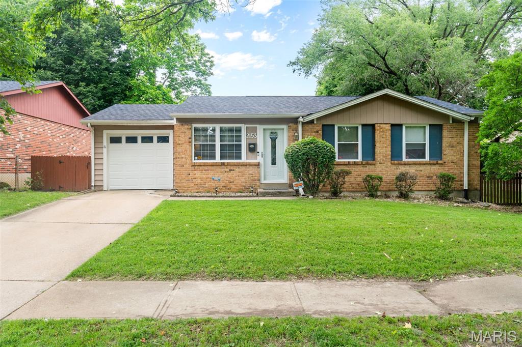 Welcome Home! This charming 3-bedroom home features a bright eat-in kitchen with a light welcoming door leading to the patio and spacious backyard. Enjoy a basketball goal, large common ground behind the home, cozy carpeted bedrooms, and a finished lower level with entertainment, seating, and workout space. Additional highlights include a newer roof (less than 1 year old), 1-car garage, and a quiet neighborhood setting. A perfect place to relax, play, and call home!
