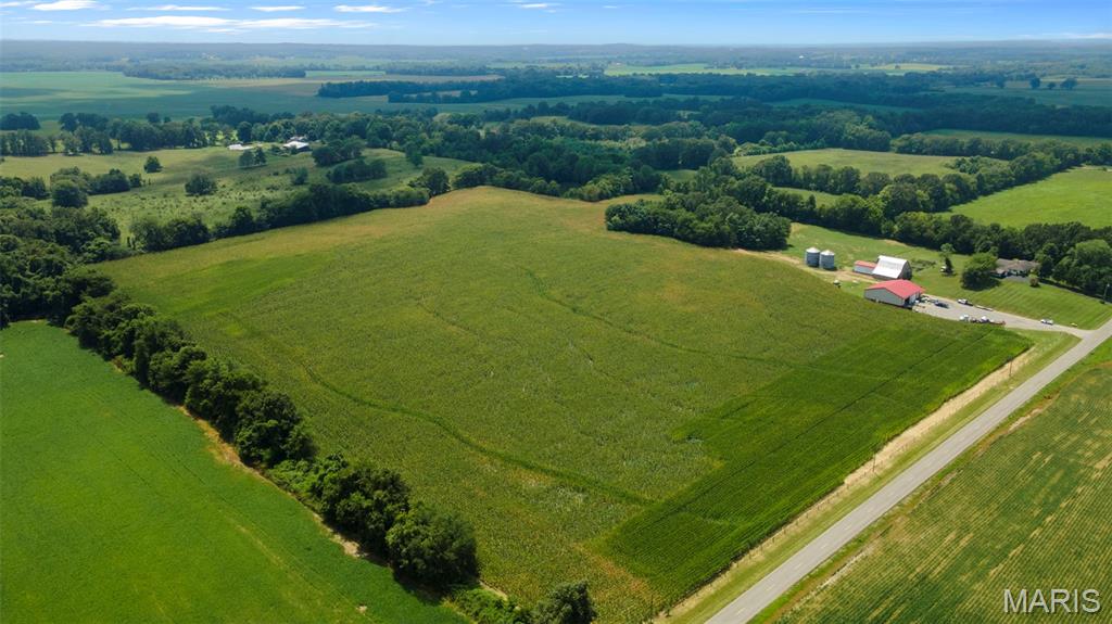This 27 +/- acre farm is located in Stoddard County off Highway K. There are multiple build sites on the property and it has great access via paved road frontage. The farm is currently tillable ground. The tillable ground boasts above-average yields on corn, soybeans, and wheat. This property would also be great for cattle. It has fencing on 3 sides currently so with a little work it could easily be in operation again. Additionally two 9,000-bushel grain bins provide ample storage for farming operations.
.