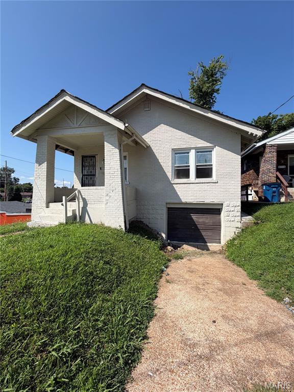 This charming 2-bedroom, 1-bath all-brick ranch offers outstanding curb appeal with a welcoming covered front porch and a highly walkable location just minutes from shops, markets, restaurants, and other everyday conveniences. The home features numerous updates, including some newer windows, newer PVC water lines and plumbing, an updated water heater, newer roof, and an upgraded electrical service and panel, providing added value and peace of mind. Inside, you'll find a spacious eat-in kitchen, a functional layout, and a full basement offering abundant storage or future finishing potential. A one-car attached garage adds everyday convenience. Whether you're looking to expand your investment portfolio or purchase a home with long-term value, this property offers excellent rental potential thanks to its desirable location, low-maintenance all-brick exterior, and key mechanical updates. With broad tenant appeal and room to build equity, this is an opportunity you won't want to miss. Property to be sold in As-Is condition.