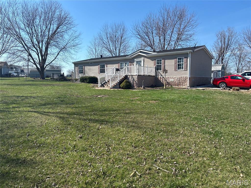 *MOTIVATED TO SELL*
This 3-bed, 2-bath manufactured home sits on 1.573 peaceful acres and offers a comfortable blend of space, privacy, and country living. Inside, you’ll find a bright, spacious front living room, a galley-style kitchen with an island, and a large back sitting room featuring a wood-burning fireplace with a stone hearth. The split bedroom layout provides a private primary suite, and the sellers recently remodeled the bathroom for a fresh, updated feel. They’ve also completed repair work on the deck. The fenced backyard adds convenience for pets, kids, or outdoor hobbies, and the front yard overlooks the neighbor’s pond. With multiple living areas and plenty of usable land, this home offers room to relax, grow, and make it your own.