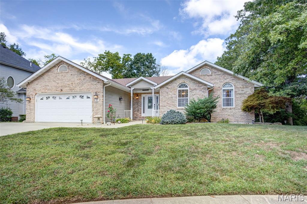 Welcome to this meticulously maintained brick ranch nestled at the end of a cul-de-sac in the desirable Fair Oaks subdivision in Troy, Illinois, and proudly located within the Triad School District! Offering over 3,000 square feet of finished living space, this spacious 4-bedroom, 3-bath home combines comfort, functionality, and thoughtful updates throughout. The large primary bedroom offers dual closets and a private and updated full bath with a beautiful walk-in shower. The inviting open-concept main level includes a remodeled kitchen with new cabinetry, countertops, flooring, and updated finishes, while the cozy living room features a gas fireplace—perfect for relaxing as the seasons change. Step outside from the dining area onto the Trex composite deck, newly installed in 2024, and enjoy the peaceful, tree-lined backyard. The walkout lower level offers incredible additional living space, including a fourth bedroom, bonus office (has water and gas hook up for a kitchen/wet bar area), large family room, additional storage, and a dedicated workshop area. This exceptional home offers the space and amenities you’ve been looking for in one of Troy’s most desirable neighborhoods! UPDATES AND AGES: 2026- front door, 2025- interior paint, 2024- Trex composite deck, 2023- concrete driveway, 2021- water heater, 2019- roof, leaf guards, gutters and HVAC.  OPEN HOUSE Sunday Aug. 23rd 1:00-2:30