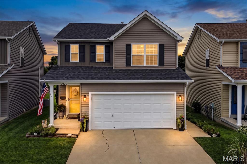 This is the ONE! A PRIME home in PRIME location is a GREAT value! This 3 bed, 2.5 bath, 2,000+ sq ft home is clean with tasteful updates & is completely move in ready! Located in one of the best spots in St. Charles, minutes away from Historic Main Street, New Town and parks galore! Upon entering you are greeted by gleaming wood floors that continue throughout the open concept main level! You'll adore entertaining friends and family from the kitchen with open sightlines over the breakfast bar, tasteful backsplash and stainless steel appliances including dishwasher, stove, refrigerator and microwave! Head out to the patio to enjoy your morning cup of coffee or host fun summer BBQ's in the full fenced, level yard that backs to common ground, pavilion, and playground! Upstairs, treat yourself to a getaway at home in the primary suite featuring an elegant coffered ceiling, a MASSIVE custom walk-in closet with organization system, and an ensuite with dual vanity! The upper level is completed by two additional spacious bedrooms offering plenty of customization options for your home library, office, or hobby room, a second full bath & laundry room with storage! Enjoy movie nights and football season in the huge recreation room with dry bar in the lower level being used as a theatre room currently! Egress window allows you to unlock the potential for this to be transformed into a 4th bedroom if you choose! This home has it all AND the potential for more plus newly updated carpet, fresh paint, lighting & plumbing fixtures, smart thermostat, and drywall finish in the garage! Someone lucky is going to scoop this up FAST. Make sure it's you and schedule your private showing today!
