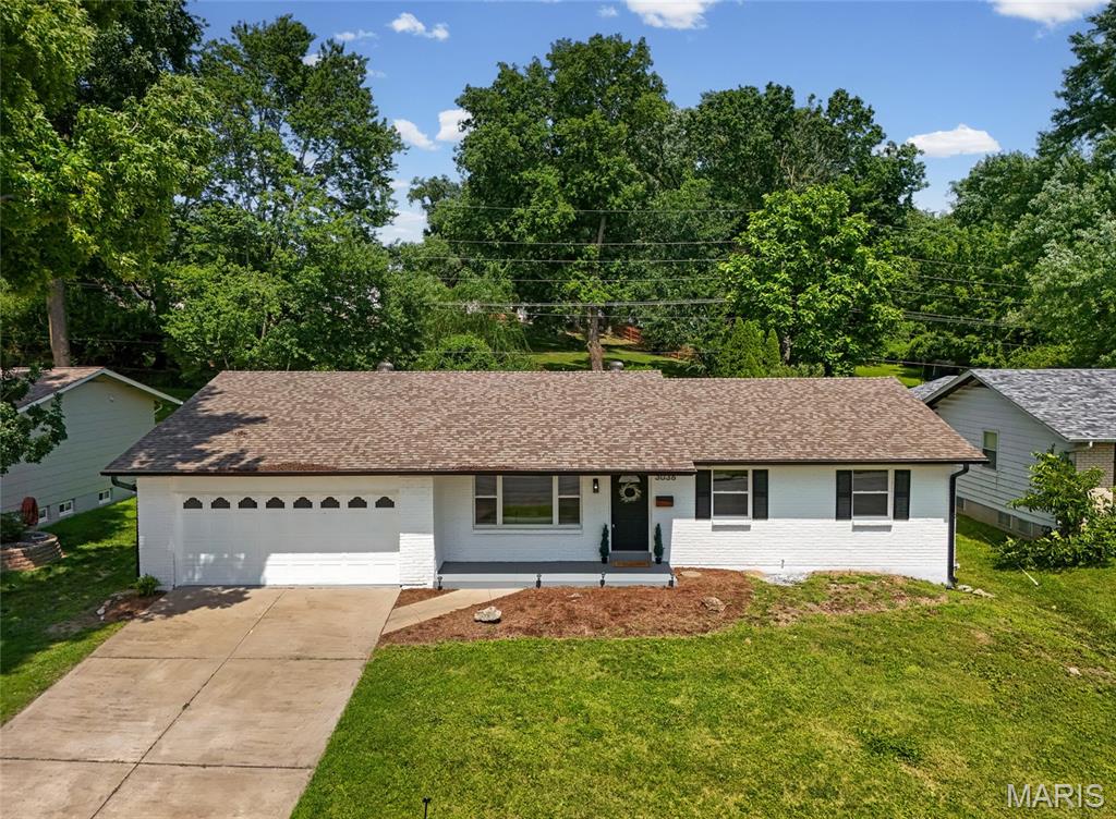 NEW PRICE & OPEN SUN 1-3PM! Welcome to this gorgeous home with over 2,200+ sqft - This 3+ bedroom ranch is perfect for the growing family. Inviting covered, front patio leads you to the inside of this newly remodeled home. Main floor features a spacious primary ensuite bedroom with a walk-in shower while the two other bedrooms are also sizable and filled with light. As you enter this gorgeous home you'll be greeted by a large living room with a fireplace and an open layout. Spacious kitchen with a center island, all new stainless steel appliances, gas range, lots of cabinetry and quartz countertops! Convenient layout - kitchen connects to the dining area. You'll love the additional family room area with a second fireplace and sliding doors to your private backyard oasis. HUGE deck - perfect for BBQs, or an outdoor kitchen setup. Big, fully fenced-in backyard, you'll have lots of areas to garden and enjoy summer activities outside - how about adding a pool? Attached oversized two car-garage and the second full bath with a linen closet round up the main floor. Lower Level boasts with additional living sqft hosting a family room, an additional sleeping room (or home office or gym), bonus room AND a large full bath. Not to mention the unfinished basement area with storage space and utility area. Lower floor could also function as a great in-law quarters. This house does not lack of size & has thoughtful finishes throughout! Move-in Ready for you. Conveniently located in the heart of St. Charles, close to Historic downtown Saint Charles and nearby all restaurants, shopping, schools and easy highway access. You'll fall in love with this home, CALL NOW