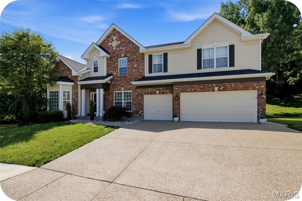 Welcome home to this stunning 4 bedroom 4.5 bath in the highly sought after Hawkins Meadow area of Fenton!  High quality finishes throughout with arched entryways, crown molding, and tall ceilings that blend seamlessly with spacious and natural light filled rooms.  On the main floor you'll find a thoughtfully planned design.  Home office with charming bay window, formal dinning room for hosting holidays in style,  large living room with stone bookshelves that opens up to a home cook's dream kitchen with granite counter tops, large island, maple cabinetry, walk-in pantry, and newer appliances.  Don't forget about a half bath, wet bar, laundry room, and mud room off the attached 3 car garage for added convenience.  Upstairs you'll find the charm and thoughtfulness continues.  A cozy living area welcomes you at the top of the stairs and connects the 4 bedrooms and 3 full baths.  Two spacious bedrooms share a Jack & Jill bathroom while a third bedroom sits across the hall from an additional full bath.  The impressive primary suite is designed with comfort in mind, featuring not one, but two walk-in closets and a spa-inspired en suite bathroom complete with a walk-in shower and a jetted soaking tub.  But wait . . . there's more!  The finished basement includes an office, a multi use room, a full bathroom, and a wet bar.   And let's step outside to your own backyard retreat, where a beautiful multi-level stone patio provides the perfect setting for entertaining or relaxing and unwinding in the hot tub.  Yard is fully fenced let your furry friends explore as well.  Lots of work put in to this stunner.  New drive way in 2025, new hardwoods on the main floor in 2026, and new roof in 2021.   Zoned HVAC includes a newer 2023 system.