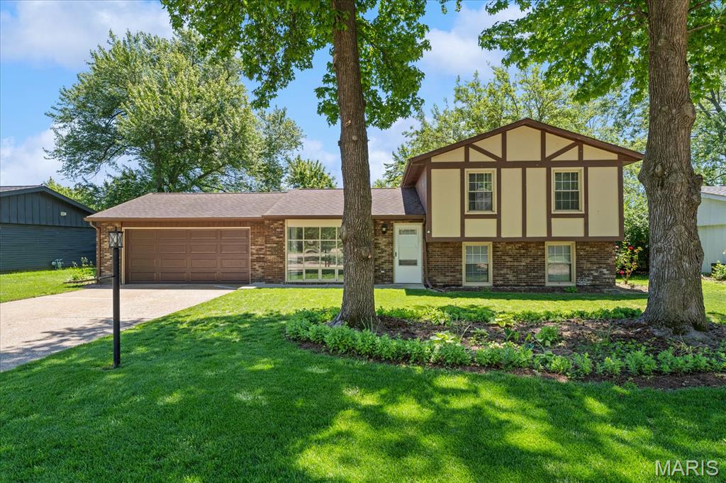 Welcome home to this IMMACULATE tri-level home offering comfortable living spaces, tasteful updates, and a layout that fits a variety of lifestyles. Step inside to find fresh neutral finishes, updated flooring, and an abundance of natural light throughout. The spacious living room welcomes you with a large picture window, while the eat-in kitchen features ample cabinetry, pantry storage, and room for everyday dining. With three bedrooms and two full bathrooms, there’s space for everyone to spread out. The lower-level family room offers a cozy fireplace, lookout windows, and the perfect setting for movie nights, game days, or relaxing evenings at home. A generous laundry/storage area and OVERSIZED two-car garage with an epoxy flooring add even more functionality. Outside, the backyard provides plenty of room to entertain, garden, or simply enjoy the outdoors. Situated in an established neighborhood close to shopping, dining, parks, and everyday conveniences, this home combines comfort, care, and convenience in one attractive package. Home has already passed County Occupancy!