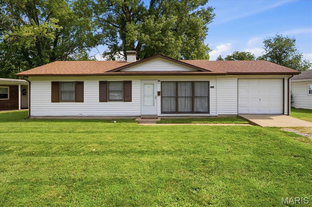Welcome home to this beautifully updated 3-bedroom, 1-bath ranch offering the perfect blend of modern finishes and everyday functionality. Situated on a generously sized lot with a one-car attached garage, this move-in-ready home has been thoughtfully refreshed throughout. Step inside to discover durable luxury vinyl plank flooring, updated doors and trim, contemporary lighting, and a bright, inviting floor plan. The stylish kitchen is sure to impress with crisp white cabinetry, stainless steel appliances, a pantry for additional storage, and the convenience of an all-in-one washer and dryer. The spacious bathroom features a tub/shower combination with an attractive tile surround and a new vanity, creating a clean, modern feel. Outside, the expansive yard offers endless possibilities for entertaining, gardening, pets, or simply enjoying the outdoors. Conveniently located in Belleville West High School, local parks, shopping, dining, and everyday conveniences, with quick access to IL-15, IL-161, and Interstate 64 for an easy commute. Scott Air Force Base is just a short drive away, making this an excellent opportunity for military personnel, first-time buyers, or anyone seeking a beautifully updated home in a convenient Belleville location
