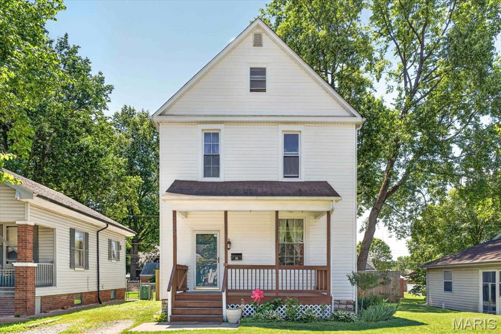 This home checks all the boxes and has been updated throughout. This 2-Story Belleville Charmer has an soaring 9 foot ceilings, timeless arched door-ways, built in book shelving, separate formal dining room, and spacious kitchen. The kitchen has an wood slat accent wall, floating kitchen island (included), oak cabinets, and large walk-in pantry. The main level also features a full bath with a stand-up shower & an attached bonus room that would make a great conversion for main floor laundry or left as is for a great flex space/office. Flowing upstairs, the second level hosts 3 great sized bedrooms and and a 2nd full bath. All BRAND NEW flooring can be found in all bedrooms and also the 2nd full bath with shower/tub combo with updated fixtures. Through one of the guest bedrooms, you can access a hidden gem where you will find a large finished bonus room with large skylights that let in tons of ample natural light or the perfect place to gaze at the stars. This area is truly unique and would make a great place to relax in privacy, rec room or even a secret playroom. Stepping downstairs, you will find a full basement with lots of usable space and storage. This home also has a nice oasis in the backyard where you'll enjoy the newer privacy fencing, thoughtful landscaping, and the perfect place for a home garden with raised bed. This is a great place for entertaining guests, pets, and play. This home has tons of updates that have been done within the last two years making this home move-in ready and ready for it's next owners. Interior photos will be posted soon.