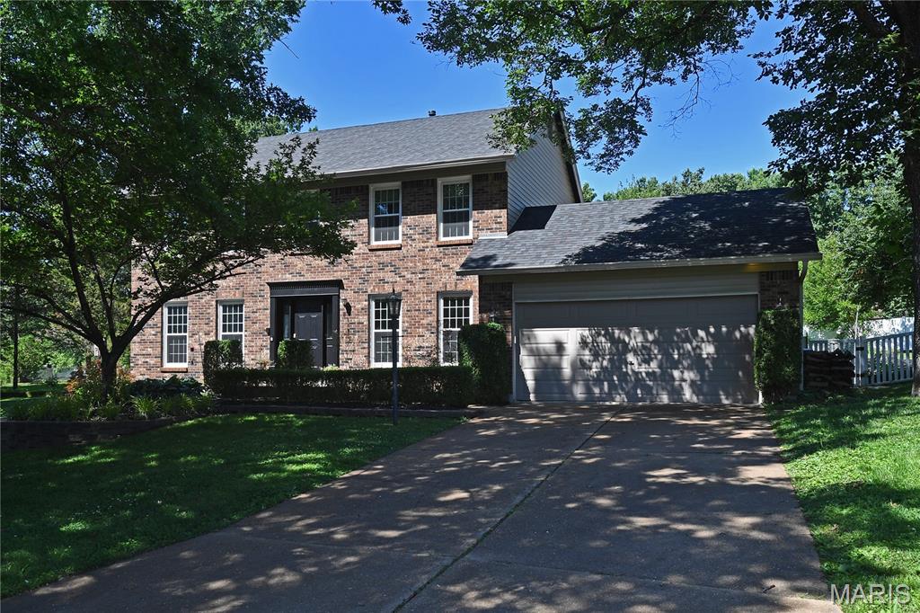 Stunning 2-story brick home offering 4 bedrooms/ 3.5 baths is an ideal blend of elegance and everyday comfort. Located in the Rockwood School District.  The main level features beautiful hardwood flooring, a private home office, and a formal dining room perfect for entertaining. The open-concept kitchen and living area serves as the heart of the home, highlighted by a large center island, abundant workspace, and a cozy fireplace. Main floor laundry.

Upstairs, the spacious primary suite provides a private retreat with a luxurious en-suite bath and generous walk-in closet. Additional bedrooms offer ample space for family and guests with additional bath.

The finished basement expands the living space with a large recreation room, a dedicated workout room, and possible office, providing endless possibilities for relaxation and recreation.

Step outside to your own backyard oasis featuring a pergola-covered patio, a beautiful inground pool, and a firepit—perfect for summer gatherings, outdoor dining, and enjoying warm evenings at home.

This exceptional property combines timeless curb appeal, functional living spaces, and resort-style outdoor amenities in one remarkable package. Move in Ready.