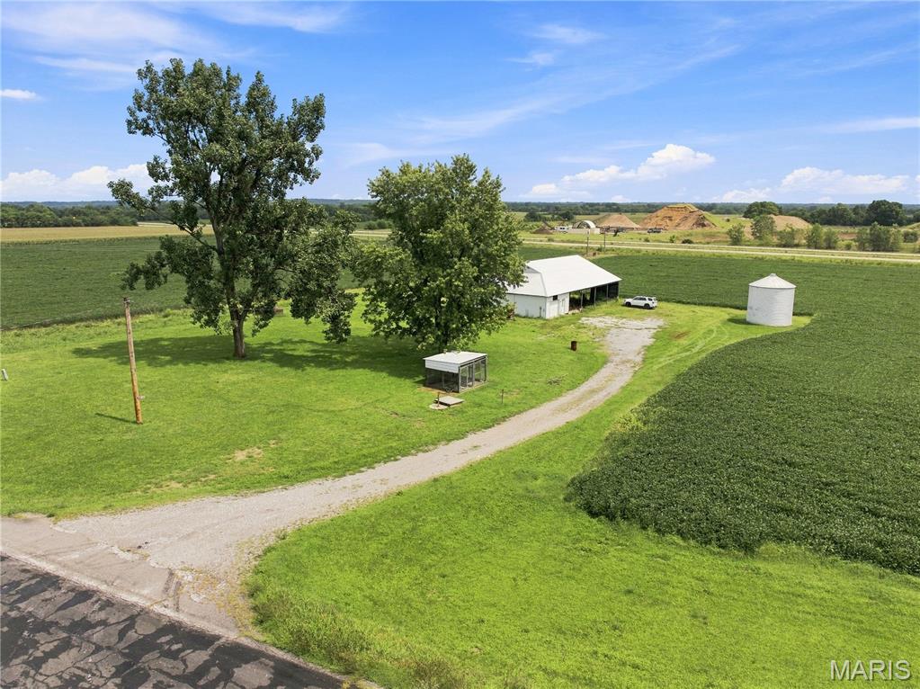 This exceptional 257-acre hunting property in Clark County, Missouri, offers multiple access points and is highly sought after for its abundant Whitetail deer and wild turkey populations. Located just 5 minutes from the Des Moines River and 20 minutes from the Mississippi River, this unique hunting farm features 120 acres of cropland balanced with timber, game cover, and hay, eliminating the need for food plots. It includes four smaller ponds (1/2 acre each) and one larger pond (3/4 acre), along with approximately 27 acres of fertile bottom land along State Route B, which houses an older pole building suitable for primitive lodging or a new build site. The remainder of the land consists of rolling upland crop ground with wooded draws, ensuring excellent cover for wildlife. The sellers have owned this property for over 70 years and managed it for quality hunting. This property is a rare find in a prime location, just a short drive from Southeast Iowa Regional and Quincy Regional Airports.