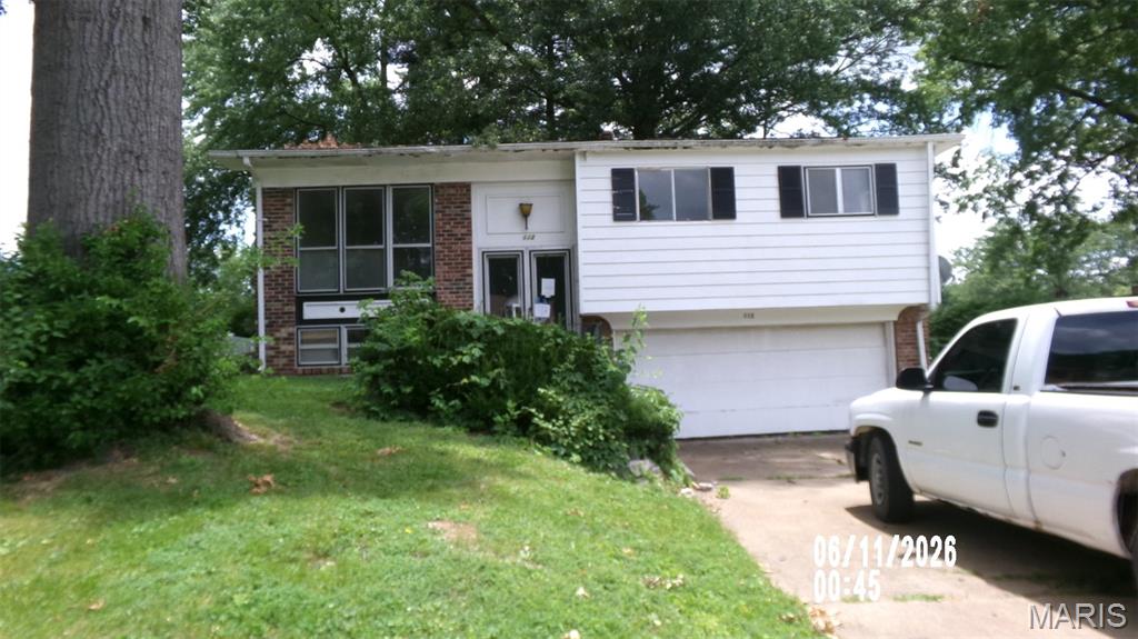 This is a 3 Bedroom, 2 Bath BiLevel home with a finished lower level & a 2 car attached Garage.. Needs TLC..