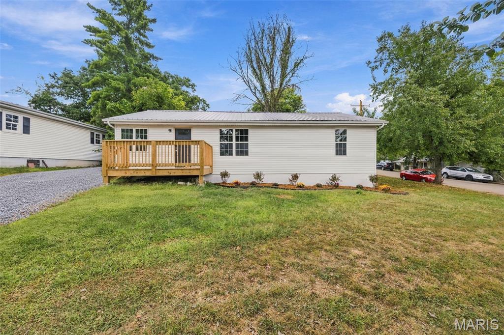 Welcome to this beautifully renovated 3-bedroom, 2-bathroom home situated on a corner lot in the heart of Potosi. Designed for modern living and complete peace of mind, virtually every surface and major system in this property has been upgraded. Step inside to an inviting open floor plan flooded with natural light from all-new windows, highlighting the stylish new flooring and new light fixtures throughout. The updated kitchen features fresh finishes perfect for meal prep and entertaining, while an oversized laundry room provides convenient extra storage and utility space.
Outside, the level yard offers endless possibilities for outdoor recreation, gardening, or relaxing.Upgrades ensure worry-free ownership for years to come, featuring a brand-new HVAC system, a durable new metal roof, and sleek new siding. Perfectly situated just a short walk or drive from local schools and downtown shopping, this move-in-ready gem combines small-town convenience with peace of mind. Schedule your private showing today before it is gone!