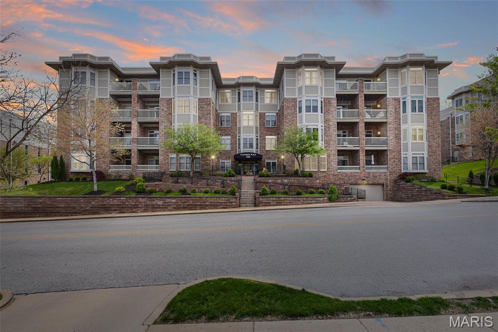 Experience upscale, urban living at its finest in this sophisticated condo at 520 North And South Rd, Unit #105, in the sought-after Claymont Place. Meticulously maintained, this 2-bedroom, 2-full bath home offers a generous 1,454 sq ft of refined space featuring an open floor plan accentuated by elegant coffered ceilings, built-in bookcases, and gleaming hardwood floors. The gourmet kitchen boasts custom cabinetry, granite counters, a breakfast bar, a pantry, and high-end appliances. The luxurious primary suite features a spacious bath with double sinks, a separate tub, and shower. Additional highlights include main-floor laundry, private balcony, secure underground assigned parking, extra storage, elevator access, and a welcoming lobby. Enjoy convenience with close proximity to dining, shopping, and public transportation. Don't miss this rare opportunity for stylish condo living in University City's prime location.