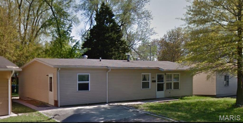 Nice ranch-style home with a spacious parking area. This property is being offered as a cash sale only, with no contingencies accepted. The home is sold strictly as-is and where-is. No interior showings will be allowed, no additional interior photos are available, and access for inspections will not be provided. No survey or keys will be issued. All listing information is deemed reliable but not guaranteed, and buyers are responsible for conducting their own due diligence prior to submitting an offer. Buyers must independently verify all property details, including but not limited to the number of bedrooms and bathrooms, square footage, room dimensions, lot size, and any other relevant information. Photos and marketing remarks are provided for reference purposes only. By submitting an offer, the buyer acknowledges they have independently investigated the property and are making their purchase decision based solely on their own findings. Buyer or buyer's agent to verify all MLS info.