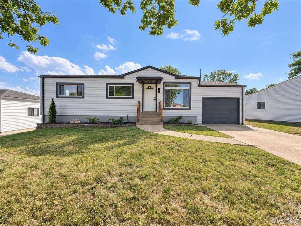 Welcome home to this adorable, completely renovated 3-bedroom, 2-bath home! So much has already been done for you, including new flooring, fresh paint, updated electrical, new lighting, and beautiful finishes throughout.

The updated kitchen features new 42-inch cabinets, countertops, backsplash, and stainless steel appliances, giving it a fresh, modern feel. Both bathrooms have also been beautifully updated.

One of my favorite spaces is the large family room with a wood-burning fireplace—the perfect spot to relax, watch a movie, or spend time with family and friends. The basement offers even more usable space, including additional sleeping space and a separate area that would make a great home office, workout room, or playroom.

Outside, you'll find a large fenced-in backyard with plenty of room for kids, pets, entertaining, or just enjoying. Easy access to shopping, restaurants, and the highway, everyday errands and commuting are a breeze.

This home has been given a fresh new look from top to bottom and is ready for its next owners to move right in and enjoy!