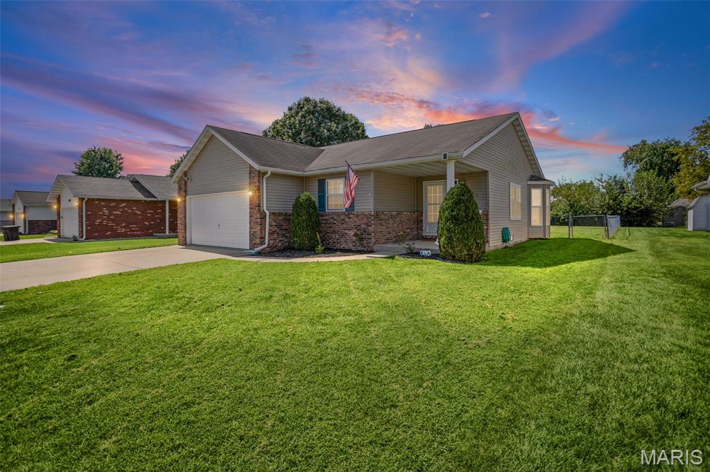 Welcome Home! This well-maintained 3-bedroom, 2-bath home offers a comfortable, open layout with the living room, dining area, and kitchen flowing seamlessly together... The kitchen features stainless steel appliances, a convenient pantry, and plenty of functionality, with the washer and dryer staying in the hallway laundry closet. The  primary bedroom includes its own private bath with a tub/shower combination, while the second full bath serves the additional two bedrooms and has been modified for easy step-in access to the shower. Enjoy the outdoors from the covered front porch or the 10x10 patio overlooking the large, level, completely fenced backyard. An 8x10 shed provides additional storage. The home also features a newer AC system installed in 2019, a 2-car attached garage, and a crawlspace with sump pump. Located in a quiet neighborhood within the Bethalto School District, this home offers a great combination of comfort, convenience, and outdoor space!