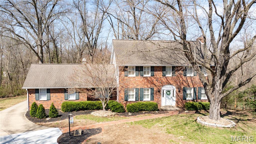 Spacious all-brick traditional two-story tucked away on a quiet cul-de-sac, backing to the Boy Scout camp for added privacy and scenic surroundings. Enjoy the feel of a neighborhood setting while still having a large, private backyard—perfect for relaxing or entertaining on the concrete patio.
Inside, you’ll find hardwood flooring throughout, a cozy wood-burning fireplace, and a functional layout featuring an eat-in kitchen with solid surface countertops and pantry, along with a formal dining room for gatherings. The home offers 4 bedrooms and 3 bathrooms, providing plenty of space.
Convenience is key with laundry options on both the second level and in the basement. A 20x20 rear-entry attached two-car garage completes the package. A rare combination of privacy, space, and location in a desirable cul-de-sac setting.