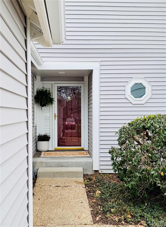LOCATION! LOCATION! LOCATION!  If you're looking for a low maintenance town home in a sought after area, close to every amenity you can imagine, look not further.   This charming two bed, four bath town home is awaiting its new owner.  The main level features hardwood flooring throughout, offering a seamless transition from the bright custom kitchen, to the stately adorned living area with rustic stone fireplace.  The living area transitions to a maintenance free deck, perfect for enjoying that morning coffee or evening cocktail.   The kitchen features brand new appliances and stunning quartz countertops. Step upstairs, to a spacious primary suite offering a HUGE updated private bath with dual sinks and walk in closet, complete with custom organizers.  A second bedroom and full bath complete the upstairs.  The lower level is partially finished and a perfect space for a secondary family room, game/rec room, or giving guests their own private retreat.  A half bath, laundry room and added storage, complete the lower level which walks out to its own private patio and fenced yard.   Additional features, include an attached two-car garage, new roof and newer furnace  Just minutes from the CHESTERFIELD AMPHITHEATER , located in a fabulous community that includes a pool, common area, fishing lake, walking trails, clubhouse, and fitness center.  This one is a must see!!