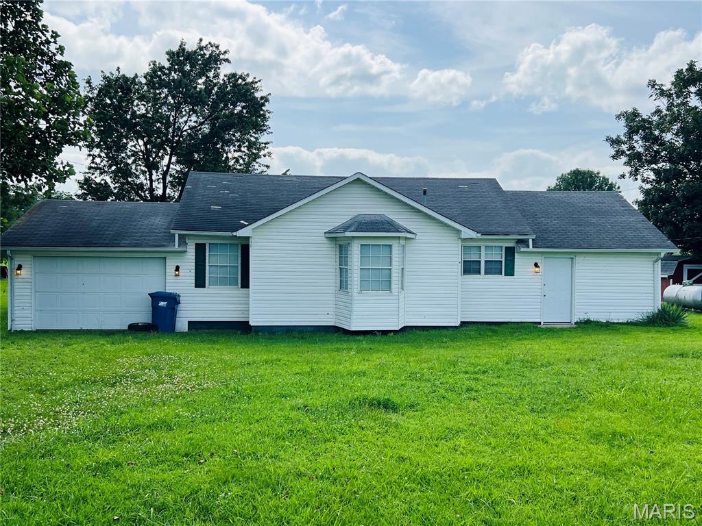 Investment Opportunity or Starter Home! This quaint home with recent updates is a perfect starter home or could make a great rental property, being located just minutes outside of Puxico! This property has a large, level yard and highway frontage. The home has recent updates including new carpet, updated light fixtures and bathroom updates, along with a separate dining area and large utility room! This home won't last long!