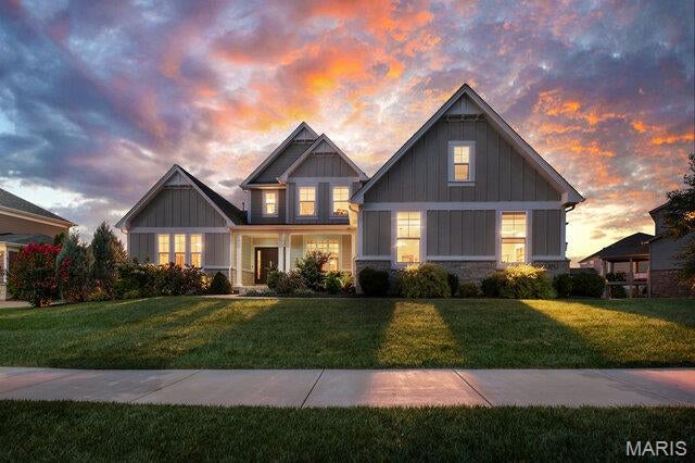 Showings begin 8/15, OPEN HOUSE 8/16 from 1-3PM. Welcome home to this exceptional McKelvey Homes-built Turnberry offering the space, finishes, and flexibility of new construction—without the wait! Just five years young and boasting over 6,000 square feet of finished living space, 7 bedrooms, and 5.5 baths, this beautifully appointed home is designed for today's lifestyle in highly desirable Chesterfield. From the moment you enter, you'll appreciate the quality craftsmanship and thoughtful design throughout. Hardwood floors span the main level, complementing the open floor plan and creating a seamless flow between the home's living and entertaining spaces. At the heart of the home is a gorgeous kitchen featuring quartz countertops, 42-inch cabinetry, a gas cooktop, generous workspace and storage, and an open connection to the main living areas—perfect for both everyday living and entertaining. Main-floor primary suite provides a private retreat and adds tremendous convenience to the home's already versatile floor plan. With 7 total bedrooms, there is exceptional flexibility for a large or multigenerational household, overnight guests, and today's work-from-home needs—including the ability to create two separate home offices without sacrificing bedroom space. What truly sets this home apart is the incredible finished lower level. Far beyond a typical basement, this beautifully completed space functions almost as a second residence, featuring 3 full bedrooms, 2 full bathrooms, a spacious family room, and workout room. Outside, relax or entertain on the covered deck with low-maintenance decking, extending the living space outdoors while keeping upkeep to a minimum. A 3-car garage provides plenty of room for vehicles, storage, and all the extras. Located in highly desirable Chesterfield and within sought-after Rockwood school district, 985 Silver Buck Lane offers a rare combination: the feel and finishes of a nearly new home with more than 6,000 finished square feet and an extensive lower-level buildout already complete. Why wait to build when everything you're looking for is already here?