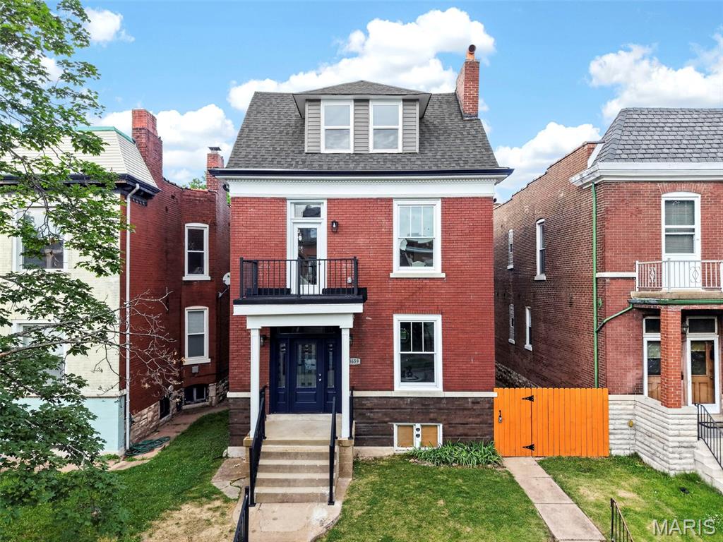 Completely renovated and reimagined from a duplex into a spacious single-family home, this 4-bedroom, 3.5-bath residence offers a thoughtfully redesigned floor plan and extensive upgrades throughout.

The main level features a welcoming foyer, separate living room, and an open-concept family room, dining area, and kitchen. The kitchen includes quartz countertops, custom cabinetry, a large island, walk-in pantry, and dedicated bar area, while the family room is centered around an electric fireplace. A powder room and walk-in coat/storage closet complete the main floor. Step outside to the new 14x12 composite deck, perfect for entertaining or enjoying the fenced backyard.

The second floor offers a spacious primary suite with a walk-in closet, additional closet, and private ensuite bath, along with two additional bedrooms, a full hallway bath, laundry room, and walk-out balcony. The third floor features a private dormer bedroom with its own full bath, ideal for guests, a home office, or flex space.

Major improvements include a completely redesigned layout, all-new dual-pane windows, new architectural shingle and TPO roofing, dual HVAC systems, new electric water heater, updated plumbing, new 200-amp electrical service and meter, hardwood flooring throughout, custom tile work, new interior and exterior doors, and rear spot tuckpointing.

Outside, you'll find a new composite deck, new concrete, a new privacy fence, and a brand-new oversized 3-car garage with EV charging capability. Located just minutes from Tower Grove Park and South Grand, you'll enjoy easy access to parks, restaurants, coffee shops, and neighborhood favorites while coming home to a truly turnkey property.