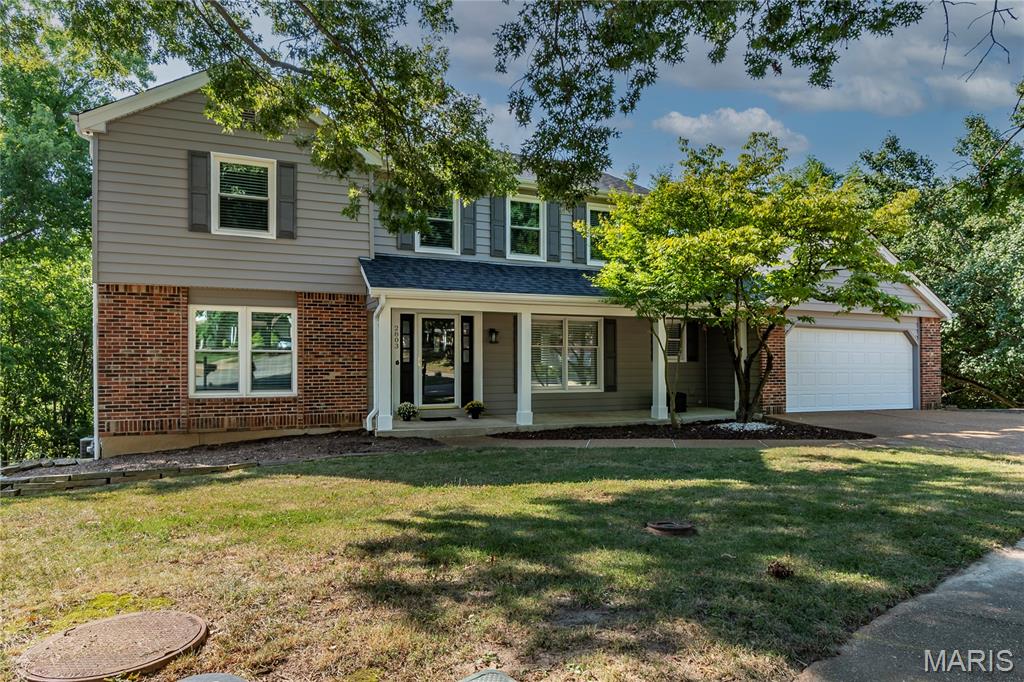 Welcome home to this spacious 4-bedroom, 3-bath home tucked away on a quiet cul-de-sac! With a new roof and new siding, some of the big-ticket exterior updates are already taken care of. Inside, you’ll find a bright and welcoming floor plan with neutral colors, updated flooring, and plenty of natural light throughout.

The kitchen offers an abundance of cabinet and counter space, stainless steel appliances, a breakfast bar, and a sunny dining area surrounded by windows. Just off the kitchen is a convenient main-floor laundry room with additional cabinetry and utility sink. The living area features a beautiful white brick fireplace, creating a cozy focal point for the room.

Upstairs, you’ll find generously sized bedrooms with great closet space, while the additional rooms provide plenty of flexibility for bedrooms, a home office, playroom, or hobby space. With three bathrooms, there’s room for everyone.

The walkout basement offers even more potential for additional living and entertaining space, storage, or a future recreation area. Outside, the mature trees and cul-de-sac location provide a peaceful setting. 

And there’s an extra special feature just beyond the backyard! Past the wooded backdrop lies the Mississippi River, offering a beautiful seasonal view. In late fall and winter, once the leaves have fallen, you can catch glimpses of the river and watch the barges cruise up and down from the back of the property—a unique view you don’t find every day!

This home has so much to offer. Come see all the space and possibilities for yourself!