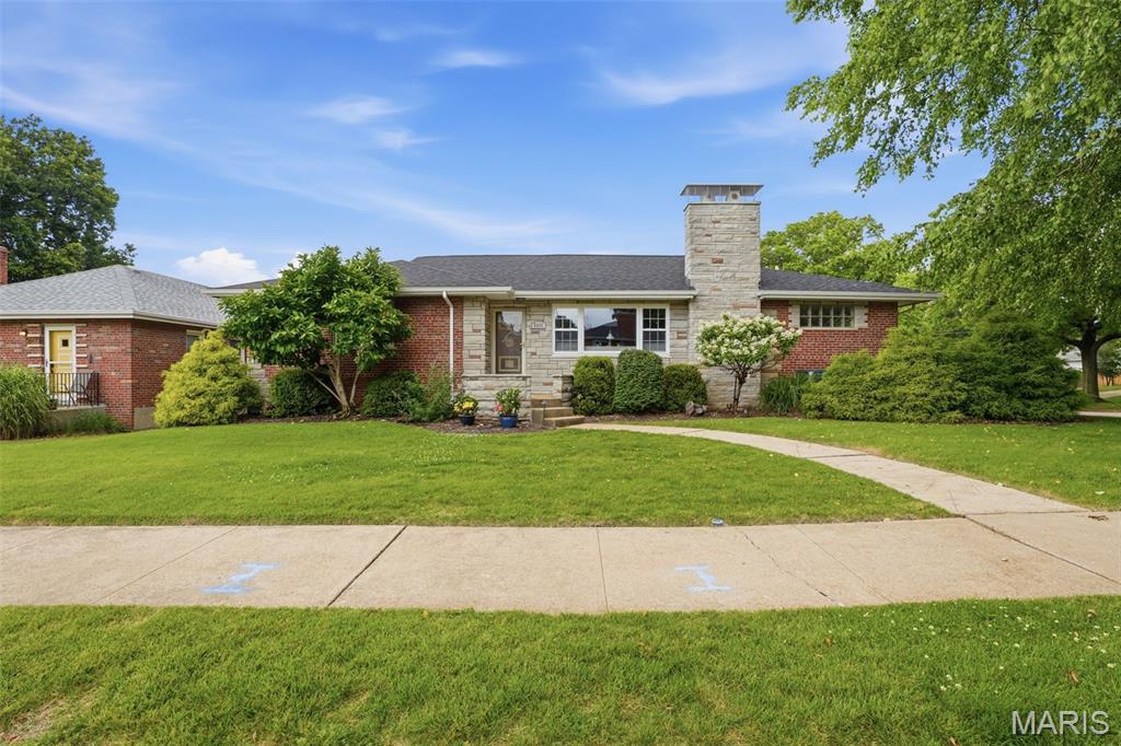 Sprawling mid-century ranch set on a rare double lot in the highly desirable Northampton neighborhood, just a short walk to Tilles Park. This beautifully maintained home offers exceptional space, character, and updates, including a newer roof newer windows and major systems, along with a hard-to-find 2-car garage. The landscaped yard with professional exterior lighting provides wonderful curb appeal, while the large, fenced backyard and patio create the perfect setting for outdoor entertaining or relaxing evenings at home. Inside, the main level features gorgeous wood floors throughout and a spacious, light-filled living room that flows seamlessly into the dining area and expansive kitchen. The kitchen is a standout with custom cabinetry, stainless steel appliances, and a center island ideal for gathering. A versatile family room or home office adds additional flexibility to fit your lifestyle. The main floor also includes three generously sized bedrooms and two updated, spa-like full baths. The finished lower level expands your living space with a large family/TV/game room, a convenient half bath, and a laundry/utility area with abundant storage. A rare opportunity to own a spacious, move-in ready home in a prime location close to parks, shopping, and all that Northampton has to offer. Contact me, the listing agent, for more details or to schedule your private showing.