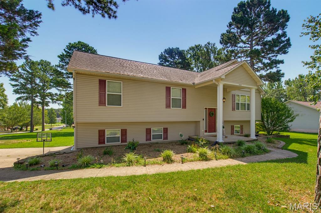 This beautiful four-bedroom, three-bath home features an open floor plan, vaulted ceilings, and an abundance of natural light. The split-bedroom layout provides excellent privacy, while the spacious kitchen flows seamlessly into the living and dining areas, creating the perfect space for entertaining. The kitchen offers ample cabinetry, generous counter space, and a convenient layout for everyday meals and gatherings. The inviting living room provides plenty of space to relax, while the dining area is perfectly positioned for family dinners and special occasions.

The private primary suite offers a peaceful retreat with a spacious bedroom and an en-suite bathroom. Additional bedrooms are generously sized and provide flexibility for guests, a home office, playroom, or hobby space. With 3 full bathrooms, this home offers comfort and convenience for both residents and visitors.

Outside, enjoy a nicely landscaped, fenced-in backyard with a screened-in covered back porch and open deck—ideal for relaxing, dining outdoors, or hosting guests. The fenced yard provides plenty of room for pets, play, gardening, or creating your own outdoor oasis. Additional features include a two-car garage, ample driveway parking, and a desirable corner lot.