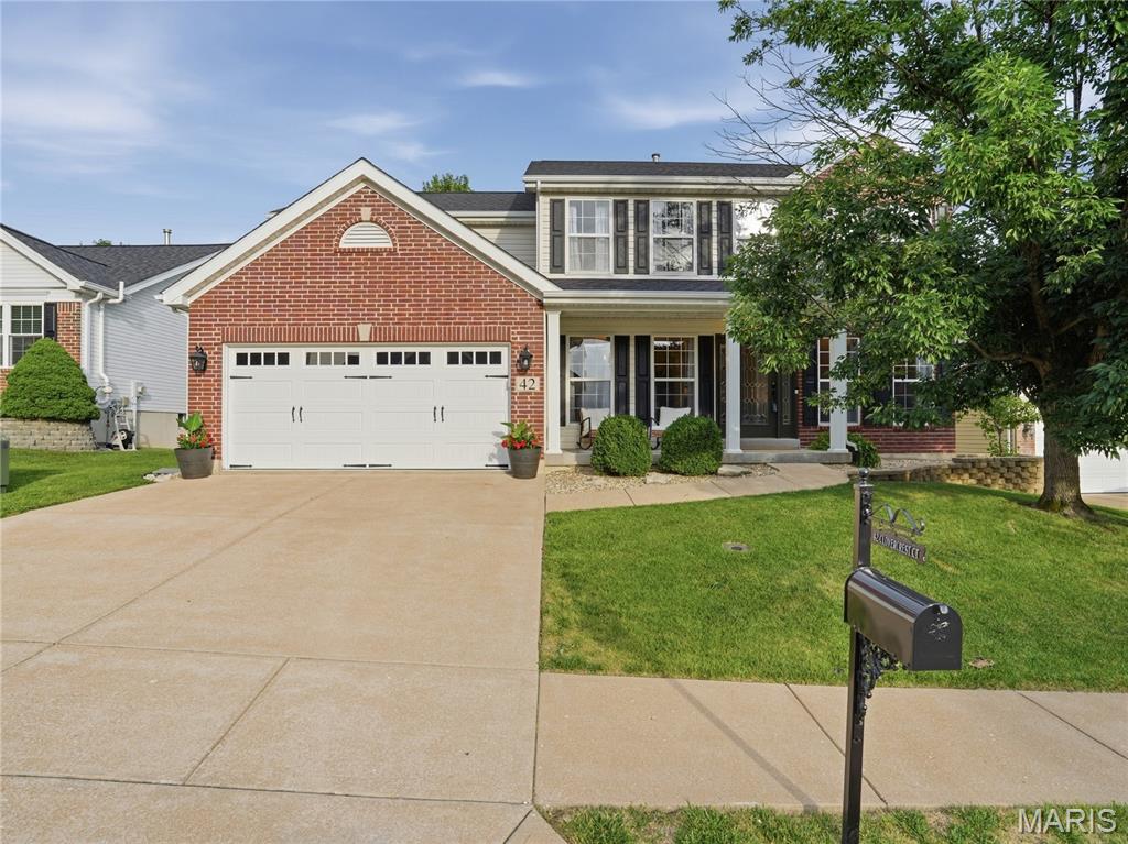 Welcome to this absolutely stunning and meticulously maintained Oakville two-story that is truly move-in ready from top to bottom! Boasting 4 spacious bedrooms, 2.5 baths, and an impressive list of updates, this home offers the perfect blend of style, comfort, and functionality. Step inside to find beautiful hand-scraped hardwood floors flowing throughout most of the main level, staircase, and upper hallway, complemented by fresh neutral paint, new carpeting, and elegant 5 1/4-inch baseboards. The updated kitchen is a showstopper featuring 42-inch white cabinetry, gorgeous quartz countertops, and ample space for cooking and entertaining. The inviting floor plan includes a convenient main-floor half bath and spacious living areas perfect for everyday living. Upstairs, retreat to the oversized primary suite complete with a large walk-in closet and a luxurious en-suite bath featuring a double-bowl vanity, separate soaking tub, and shower. Major updates provide peace of mind, including a NEW roof (2025), New gutters, downspouts, fascia, zoned HVAC system, new fence, newer water heater, and new garage door. Outside, enjoy the level, fenced backyard—ideal for entertaining, pets, play, or simply relaxing. Every detail has been thoughtfully updated and maintained, making this Oakville beauty the one you've been waiting for. Simply unpack and start enjoying your new home!
