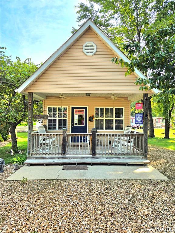 SORRY THIS HOME CANNOT BE OR USED AS A RENTAL OR AIR B & B.  OWNER OCCUPIED USERS ONLY.

OWN your own fully furnished vacation cabin/tiny home in Hermann, MO!

- This 2 story cabin comes FULLY FURNISHED with couches, table, beds, frig, washer/dryer and even the decor!!
- PLUS the tool shed comes fully loaded with all tools INCLUDING THE GOLF CART!
- PLUS this cabin includes an additional lot, complete with grown trees and a fire pit!
- PLUS there’s a nice patio with you guessed it, patio furniture!
- PLUS large front porch with rockers and bench
- PLUS Electric, Water and Septic 

This is a 3-season vacation cabin, so it’s typically winterized for the cold months.

The upper level is all open with 2 beds and a couch.    

This home is located in Gascony Village, about 20 minutes from downtown Hermann, check out all of the community exclusive amenities:

- Private Boat Launch and Beach on the Gasconade River
- Huge Swimming Pool with Bathrooms and Shower House
- Private Fishing Lake
- Private Gravel Roads
- Club house
- Covered Pavilions
- Playgrounds and Sand Volleyball

Close to the wineries and right on the Gasconade River, this community has it all! Enjoy jet skiing, boating, 4 wheeling, swimming, and bonfires or cookouts with neighbors. Celebrate holiday weekends with events including kids cake walks, golf cart parades, washer tournaments, poker runs, booze walks for the adults, basket raffles, bingo, live bands and friends galore!