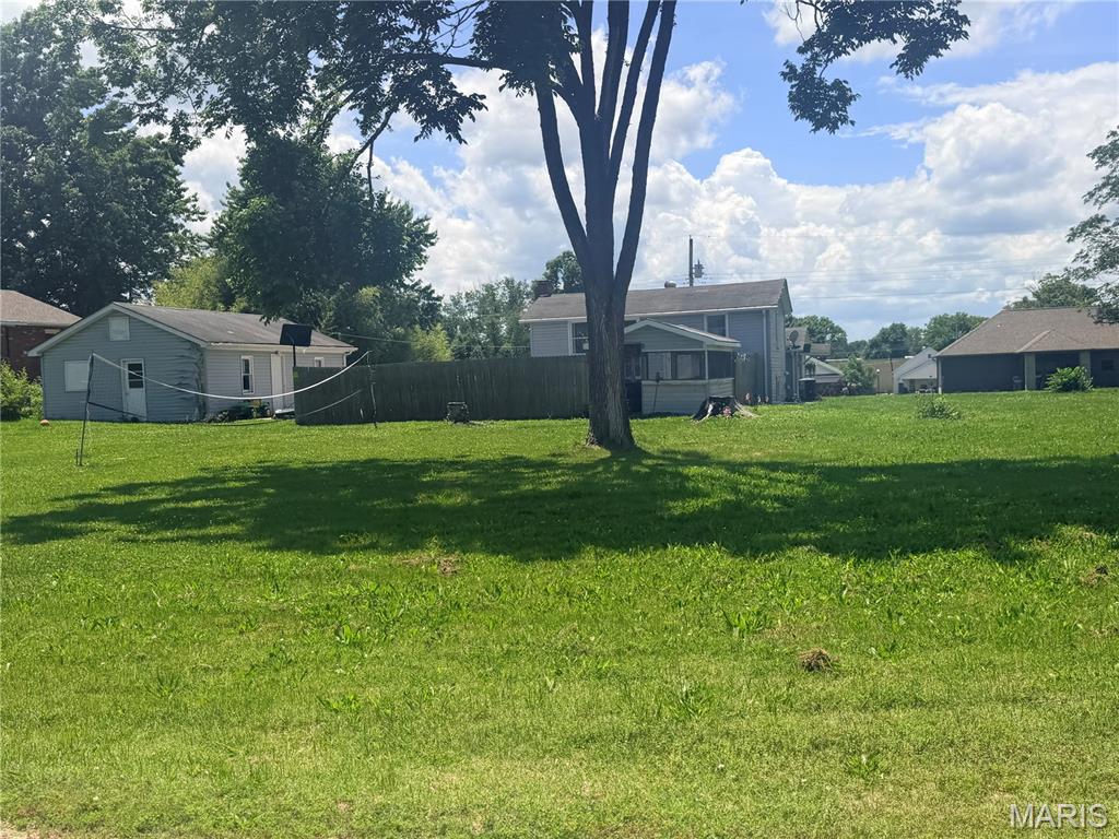Great investment opportunity! This 3 bedroom, 1 bath tri-level home features a patio, 2 car detached garage, and additional carport for extra parking and storage. Situated on a spacious double corner lot, this property offers the potential to survey off an additional lot for a future home build or investment opportunity. Perfect for investors or buyers looking for added potential and value. Great opportunity — act quick before it’s gone!
