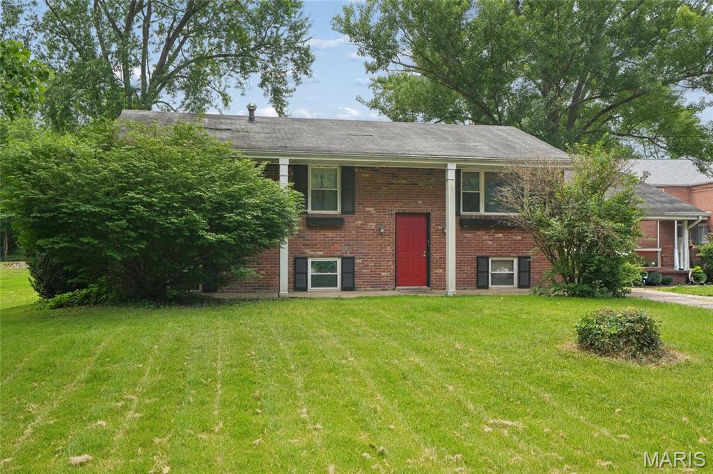 Welcome home to this beautiful 4-bedroom, 2-bath gen offering the perfect blend of comfort, space, and convenience in a prime location in Fenton. From the moment you walk in, you'll love the gorgeous hardwood floors, spacious layout, and inviting feel throughout. The main level features 3 bedrooms, with a full bath, and a bright kitchen with abundant cabinet space. All kitchen appliances included, plus a brand-new dishwasher. The kitchen flows into a separate dining room and opens to a large deck - perfect for summer BBQs, entertaining friends, or relaxing with your morning coffee overlooking the park like, level backyard. Outdoor living shines here with a seasonal 18' pool and an expanded deck area ideal for sunbathing, easy pool access, and making the most of warm Missouri days. The finished lower level adds incredible versatility with a spacious rec room perfect for movie nights, game days, or family gatherings. You'll also find a 4th bedroom that makes an ideal guest suite, teen retreat, plus an additional bonus room perfect for a home office, playroom, workout room, or hobby space. A 2nd full bath on the lower level adds extra convenience for guests and everyday living. Additional highlights include an oversized carport and extra parking spaces. Conveniently located near shopping, restaurants, parks, schools, and major highways, this move-in-ready home offers the space, and location buyers are looking for with some cosmetic updates needed to customize your home. Home Warranty offered for buyers' peace of mind.