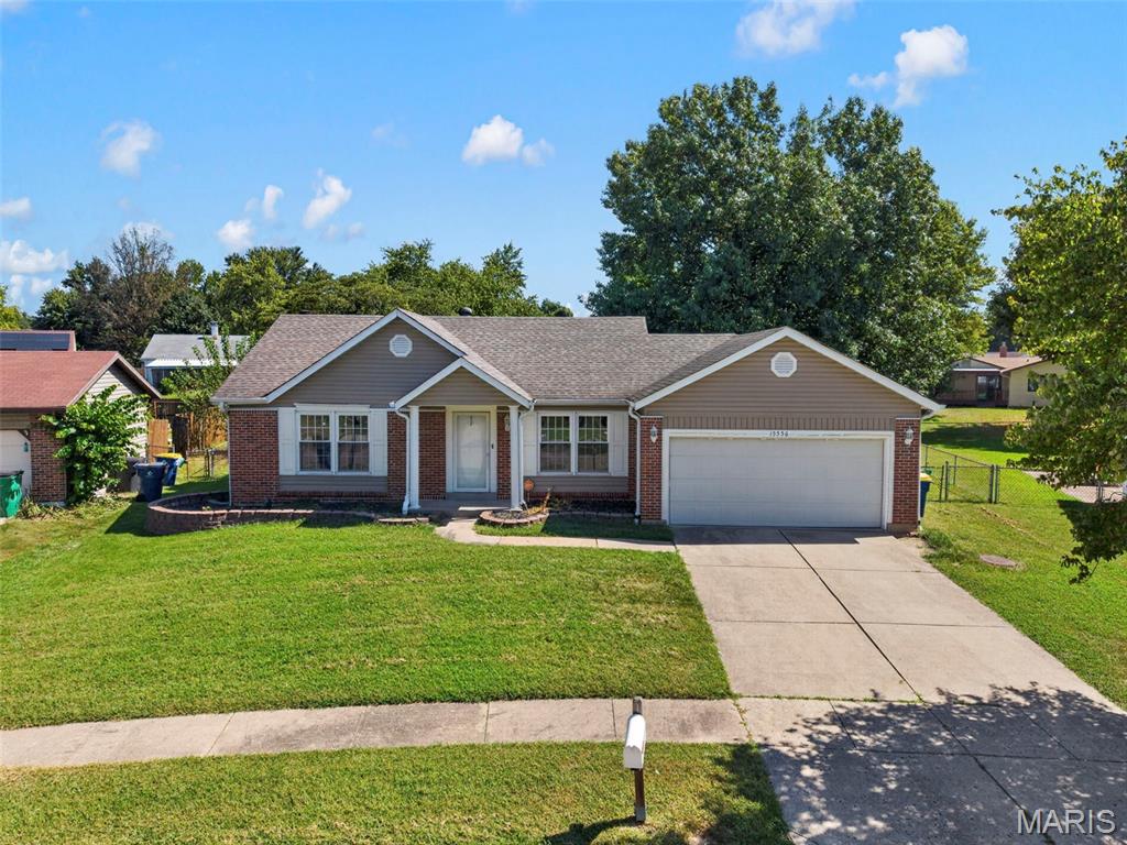 Welcome home to 15556 97th Ave! This inviting brick-and-siding ranch offers a comfortable, functional floor plan with a warm and welcoming feel throughout. Fresh interior paint and new carpeting create a clean, updated look, while the spacious living room features a classic brick fireplace and abundant natural light. The kitchen offers generous cabinetry, tile flooring, a stylish backsplash, and ample workspace, with an open pass-through to the living area that makes entertaining easy. Spacious bedrooms provide plenty of room for furniture and everyday living, and the beautifully appointed bathroom features a large vanity and abundant storage. Outside, enjoy a generous level backyard with plenty of room for play, entertaining, gardening, or relaxing. The attached two-car garage provides convenient parking and storage. A great opportunity to own a comfortable move-in ready ranch home in a convenient Florissant location!