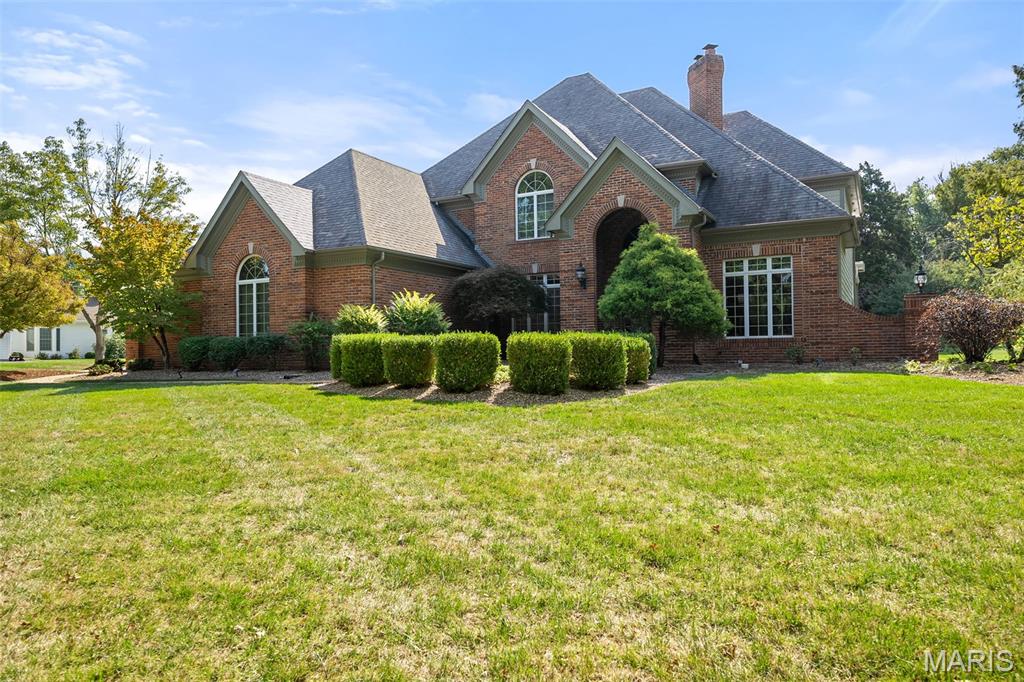Experience luxury living in this executive Dunhill Farm home designed for both everyday comfort and unforgettable entertaining. A handsome wood-paneled office, elegant center hall plan, and spacious dining room set the tone, while the functional kitchen with breakfast room flows seamlessly into the hearth room with a fireplace flanked by custom built-ins. The family room is a complete showstopper- stone surround fireplace, wetbar area, and a freestanding concrete bar with hydraulic garage door opening to a patio make indoor and outdoor living seamless.  Outside, there is a hot tub, built in fire pit and bbq, and covered seating—perfect for gatherings and celebrations.  The main floor also offers a laundry room, mudroom, and 3-car garage. Upstairs, the impressive primary suite features a private balcony overlooking the rear yard and spa-like bath with double vanity and separate shower and bathtub. Additionally there are three more guest bedrooms including an en-suite and Jack-and-Jill. All bedrooms are private, spacious and have great closet space. The lower level is an entertainer’s dream with a cozy rec room, game room with wet bar, exercise area, sleeping quarters, full bath, and plenty of storage.  This impressive home is set on a vibrant, lively lot and showcases top-tier finishes throughout.  Stylish, spacious, and completely move-in ready, its the perfect blend of luxury and comfort.