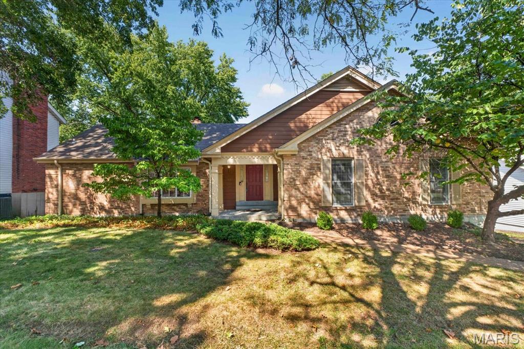 Opportunity awaits in desirable Ridgemont Subdivision! This spacious 1,940 sq. ft. ranch offers a great layout, a peaceful wooded setting, and plenty of potential to make it your own!

The kitchen opens to a charming breakfast room with hardwood floors and a see-through fireplace shared with the living room, creating a warm and inviting gathering space. A separate dining room, also with hardwood floors, connects easily to the main living area and gives the home a comfortable flow for everyday living and entertaining. French doors from both the breakfast room and living room open to a large deck overlooking the backyard and wooded common ground. It is a great spot for morning coffee, entertaining, or simply enjoying the view.

The primary bedroom features a walk-in closet and large ensuite bath. Two additional bedrooms, a hall bath, and a generous linen closet complete the main level. The linen closet may also offer potential for a future main-floor laundry.

The full unfinished lower level is ready for your ideas and could provide additional living space, a rec room, home office, hobby area, or whatever works for you. A bathroom rough-in is already in place, adding even more flexibility for future finishing. The oversized two-car tuck-under garage offers plenty of storage plus workshop space.

Conveniently located between Manchester Road, Dougherty Ferry Road, Hwy 141 and I-270, this home puts you close to everything while still offering a quiet neighborhood setting.

Great bones, a great location, and plenty of opportunity. Bring your vision and make it your own! Property is being sold as-is.