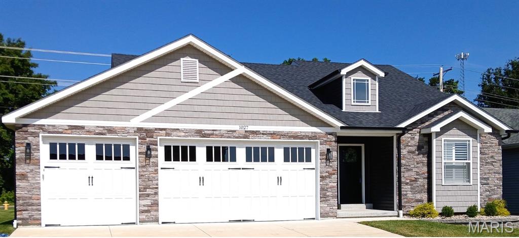 Home is currently under construction, a rare opportunity to choose your finishes to truly make it your own. Welcome to this beautiful custom-built 3-bed, 2-bath ranch with an oversized 3-car garage, perfectly situated in the highly desirable Raintree Plantation. Inside, you’ll find numerous upgrades that combine elegance with function, quartz countertops, a large center island, stainless steel appliances, 42-inch cabinetry, and a spacious vaulted floor plan that welcomes natural light. The inviting fireplace creates the perfect spot to relax, while the 12x12 covered deck offers views overlooking the 18th fairway. The open oak stairwell with black spindles and laminate plank flooring throughout the main living area add modern sophistication. The lower level, lookout windows, and rough-in plumbing, provides the option to add another bedroom or create the entertainment space of your dreams. Curb appeal abounds with upgraded vertical siding, stone dormer with a 2' extension to depth of garage, and striking North Hampton garage doors with windows—a look sure to make your home stand out. Raintree offers resort-style amenities including a golf course, swimming pool, white sand beach, water skiing, tubing, and a restaurant and bar-all just minutes from your doorstep. Don’t miss the chance to make this dream home your own. Call today for details and secure your opportunity to live in the most sought-after community in JeffCo! HOA fee's and Clubhouse fee's are separate please inquire before you offer- colors and features may vary-it's time to make that move to Easy St.!