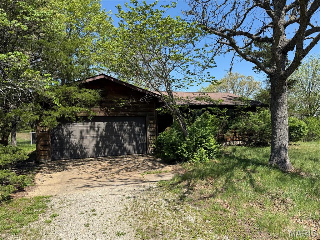 MULTIPLE OFFERS HAVE BEEN RECEIVED. HIGHEST AND BEST DUE 5/7/26 by 1:00 PM. Set on three peaceful acres, this charming 3-bedroom, 2-bath home offers the perfect blend of space, privacy, and potential. Surrounded by a quiet, natural setting, the property provides plenty of room to relax, garden, or expand. Inside, the home features a comfortable layout with generous living areas and abundant natural light throughout. The unfinished basement presents an excellent opportunity to customize—whether you envision additional living space, a workshop, or extra storage. Ideal for those seeking a serene lifestyle with room to grow, this property combines rural tranquility with everyday convenience.