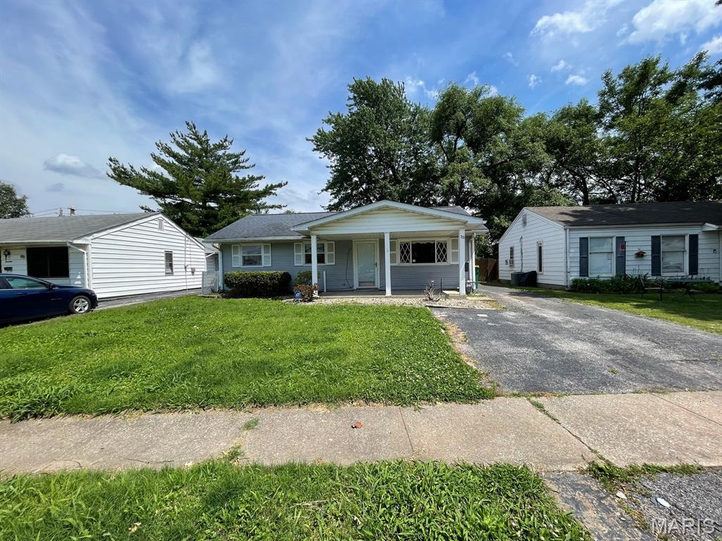 Welcome to 15 Briarcliff in Granite City! This spacious 4-bedroom, 2-bath home offers an open floor plan with all bedrooms and bathrooms conveniently located on the main level. The generous living space offers flexibility for a variety of needs. The primary bedroom features a walk-in closet and private 3/4 bathroom. The additional three bedrooms share a full bathroom. The kitchen and living room flow together, creating an open and functional layout. Enjoy the rear glass-enclosed porch, offering additional space to relax or unwind, along with a covered front porch. Laundry hookups are conveniently located in the hallway. Conveniently located near shopping centers and bus lines, this property offers plenty of interior and exterior space to make your own. Schedule your showing today and explore the possibilities! This property may qualify for Seller Financing (Vendee). If Property was built prior to 1978, Lead Based Paint Potentially Exists Buyer and/or buyer agent to verify all MLS data.  Property details, dimensions, permitted uses, and all information should be independently verified by the buyer and buyer's agent.