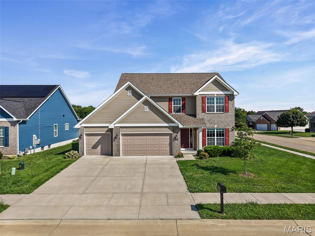 Located in Shiloh on a corner lot, this spacious, almost NEW, Jefferson floorplan by Fulford Homes offers over 4,000 sq ft of finished living space with 5 bedrooms, 3.5 baths, multiple living areas and a 3-car garage! The main level offers an open, comfortable layout with plenty of room to spread out, beginning with a large den with French doors that would make a great home office or flex space. The kitchen is truly the heart of this home and offers both the space and finishes buyers are looking for, including 42" soft-close cabinetry, quartz countertops, a center island with built-in microwave and a generous walk-in pantry. There is an abundance of cabinet and counter space for cooking, storage and entertaining, while the island adds additional prep space and a natural gathering spot. The kitchen opens directly to the dining and living areas, creating a bright, open space that works just as well for everyday living as it does for hosting. A mudroom, main-floor laundry and powder room complete the first floor and add even more convenience. Upstairs, the spacious primary ensuite features a tray ceiling, large walk-in closet and private bath with double vanity, soaking tub and oversized shower. Three additional bedrooms, a full bath and an expansive loft provide even more flexible living space and plenty of room for everyone. The finished lower level adds another entire level of living with a 5th bedroom, full bath and large recreation room perfect for guests, movie & game night, or second family room. (there is also a bonus room that could be used as a non-conforming 6th bedroom) Outside, the large corner lot gives you extra room to enjoy, while the 3-car garage offers plenty of space for vehicles, storage and toys. Enjoy neighborhood amenities including the community pool, along with nearby parks, dog park and walking trails. Conveniently located in Shiloh near shopping, dining and interstate access, this home offers an incredible amount of space in a location that makes getting just about anywhere easy! Under 20 minutes to Scott AFB!